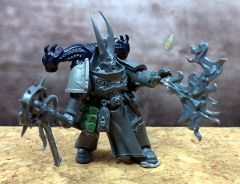 The Scourged Chaos Space Marine Asiring Chamion /w Powermaul & Combiflamer horny face