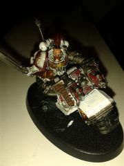 deathwatch model being painted as a Khan stand in