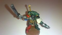 Chaplain with chainsword and bolt pistol