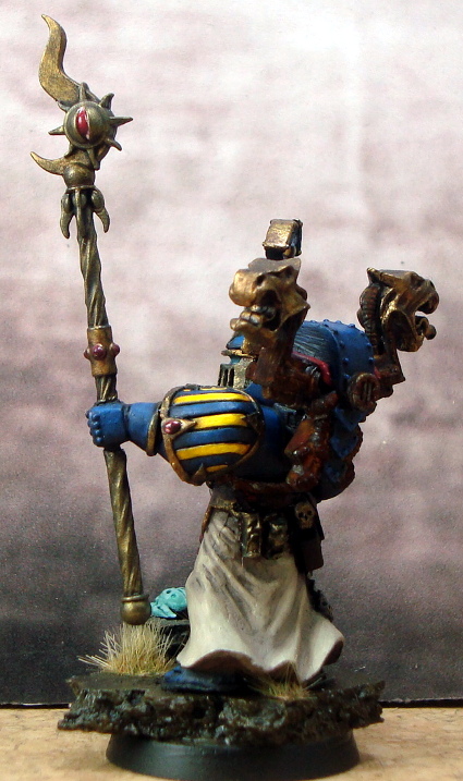Thousand Sons sorcerer with staff and MK II helmet left