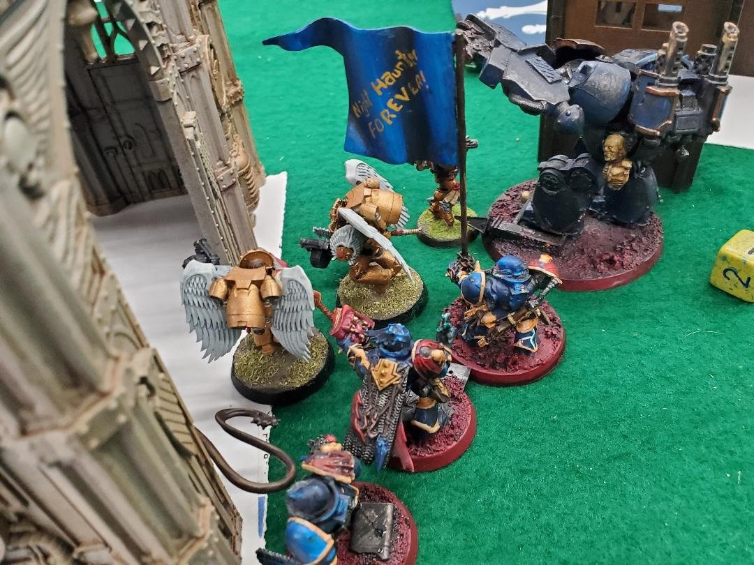 9. Jackals and Malcharion Charge Sanquinary Guard N.jpg