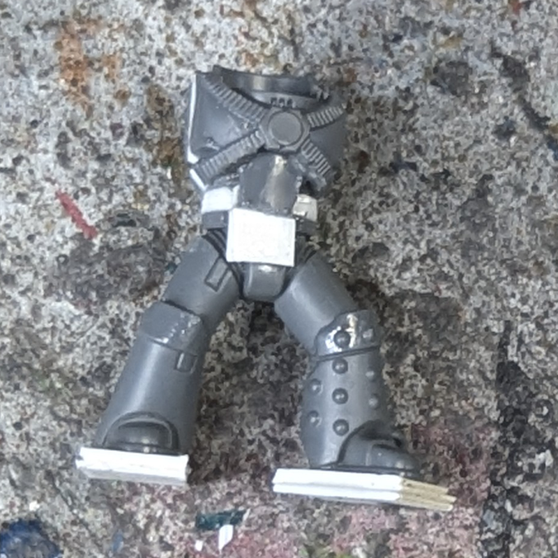 Image shows correct spacing and size of plasticard spacers under foot.